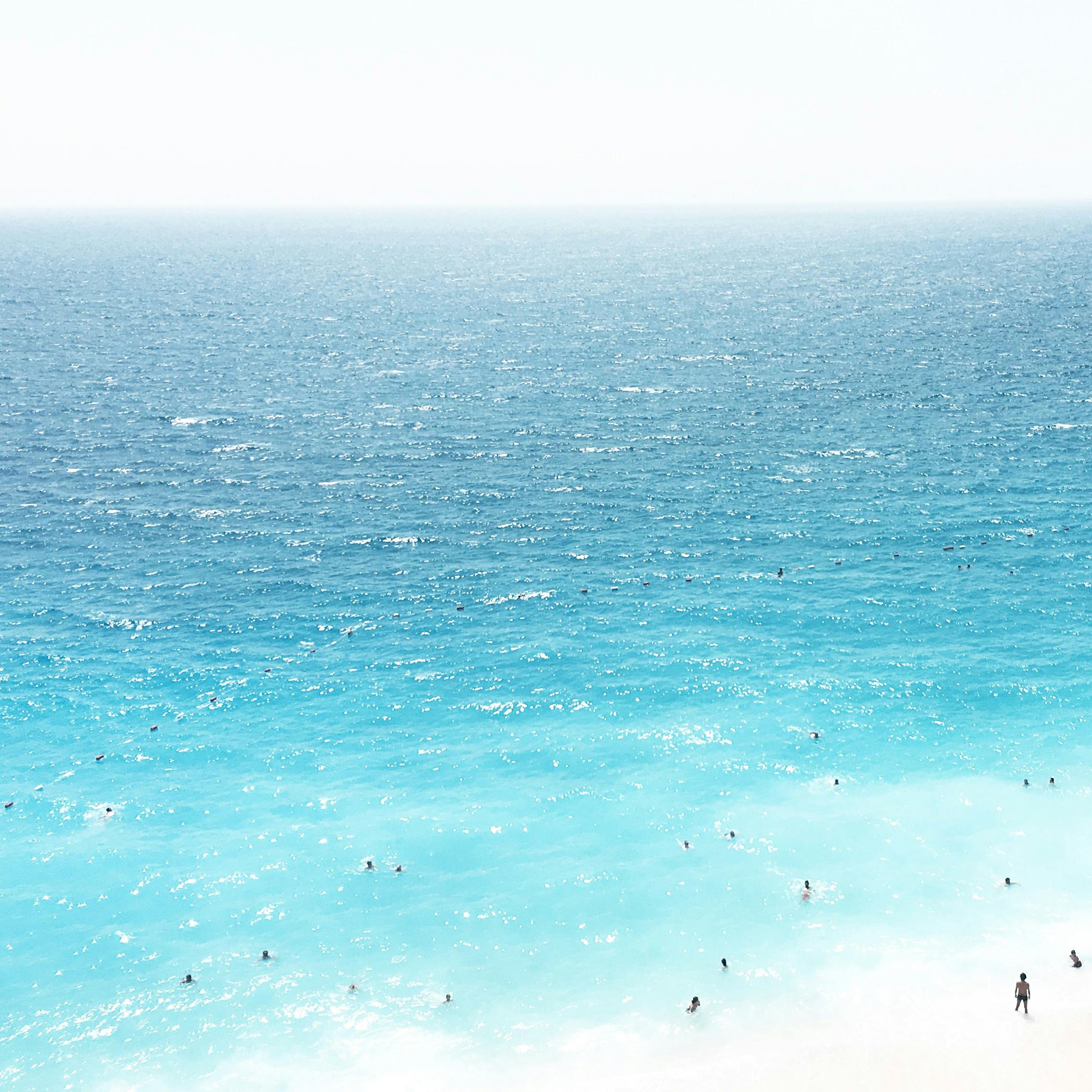 Stunning aerial shot of people enjoying the turquoise waters near Kaş, Turkey.